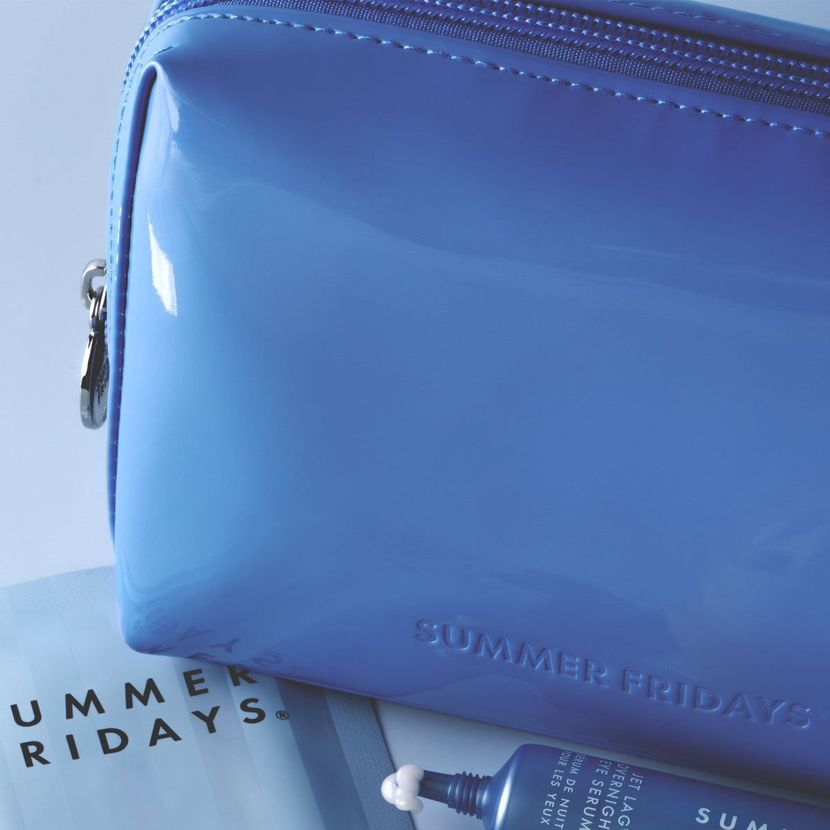 glossy-pouch-in-jet-lag-blue-n8 Glossy-Pouch-Jet-Lag.jpg
